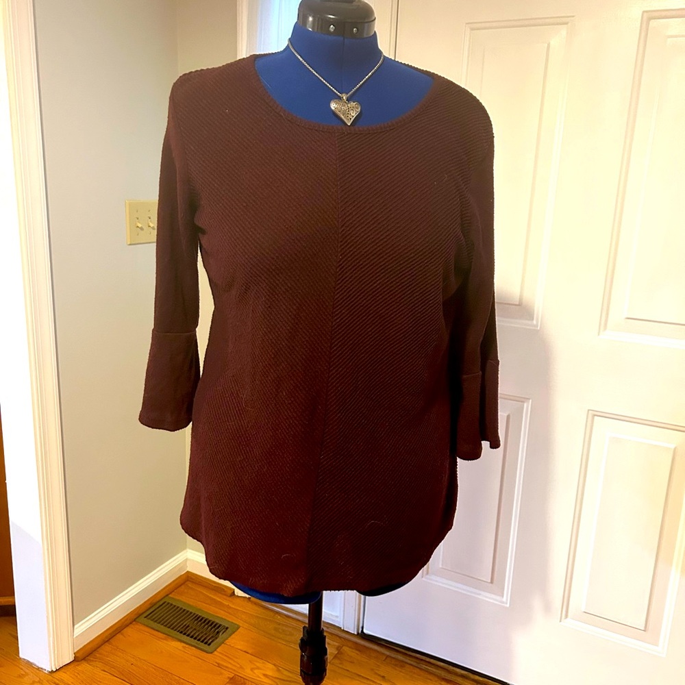 Burgundy. Polyester and spandex